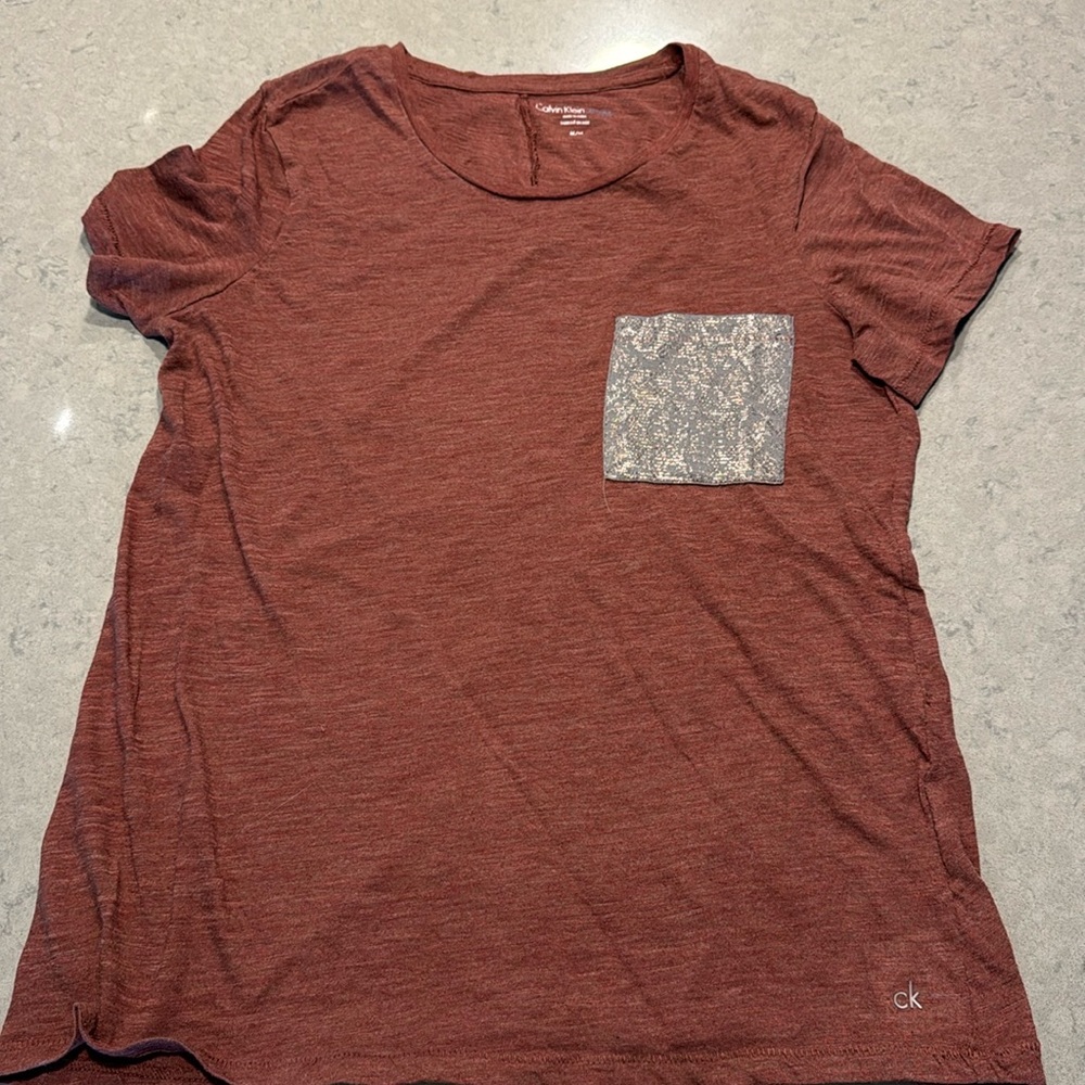 Woman Calvin Klein top | used vintage maroon with silver breast pocket